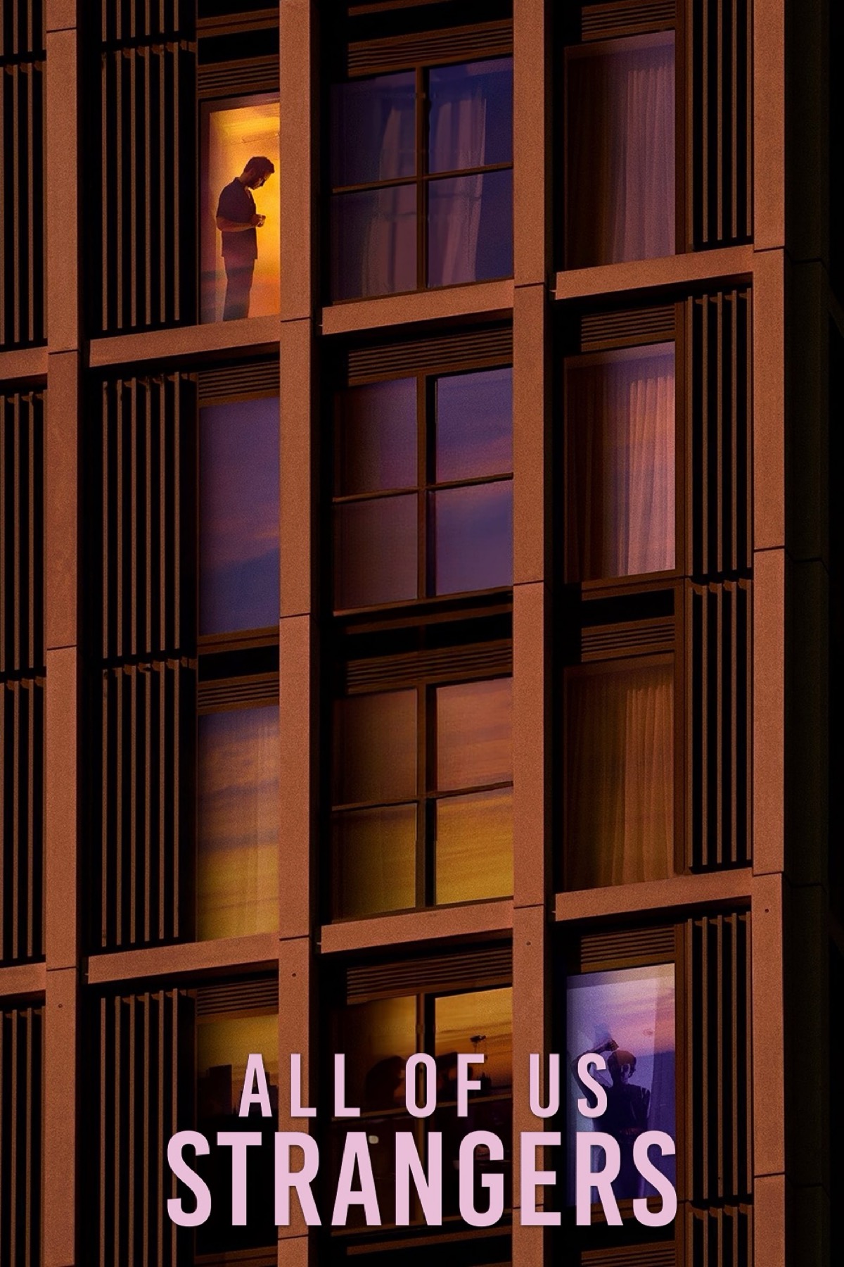 A picture of the side of an apartment block. Two windows are lit up and there is the silhouette of a man standing in each one