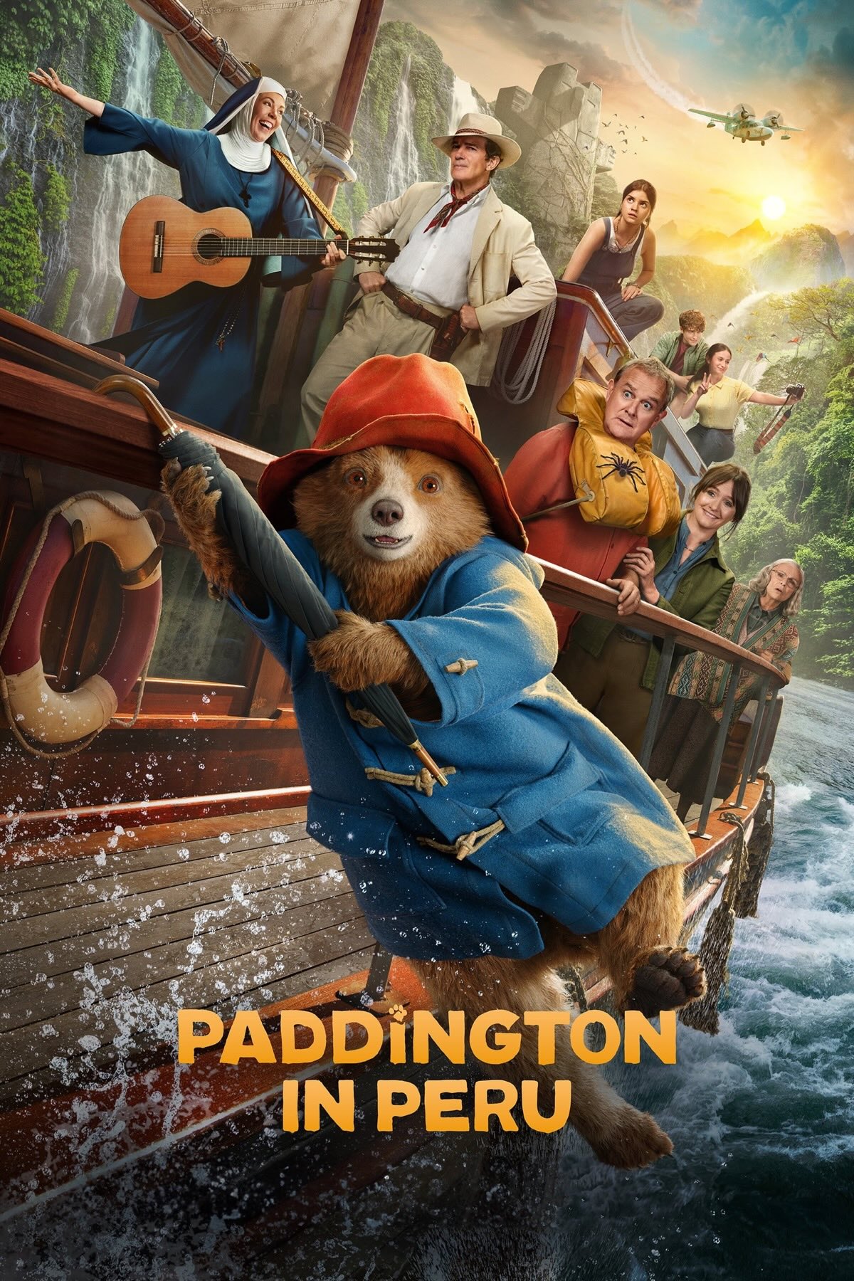 Paddington hanging off the side of a boat via a hooked umbrella.