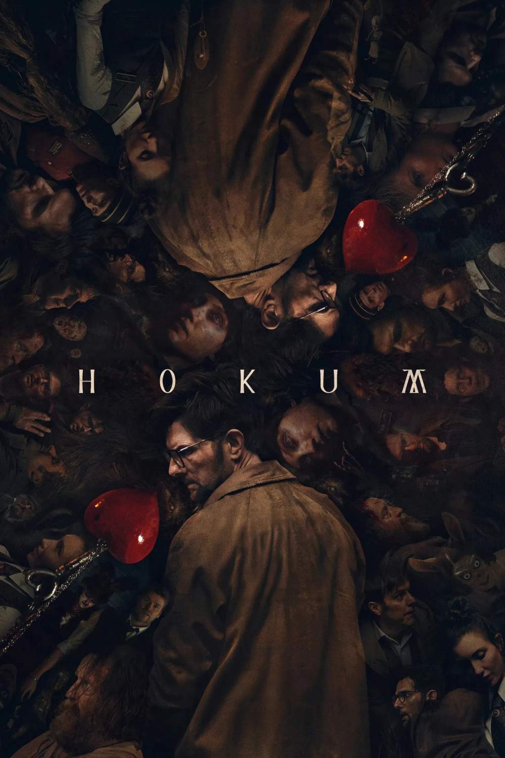 Poster for the film Hokum. A collage of pictures of people. The largest is of a white middle aged man in a dingy brown raincoat with his back to the camera. The image is flipped vertically so he appears twice in the poster, once upside down. There are also a lot of dimly lit headshots of other characters as well as a bright red love-heart keyring.