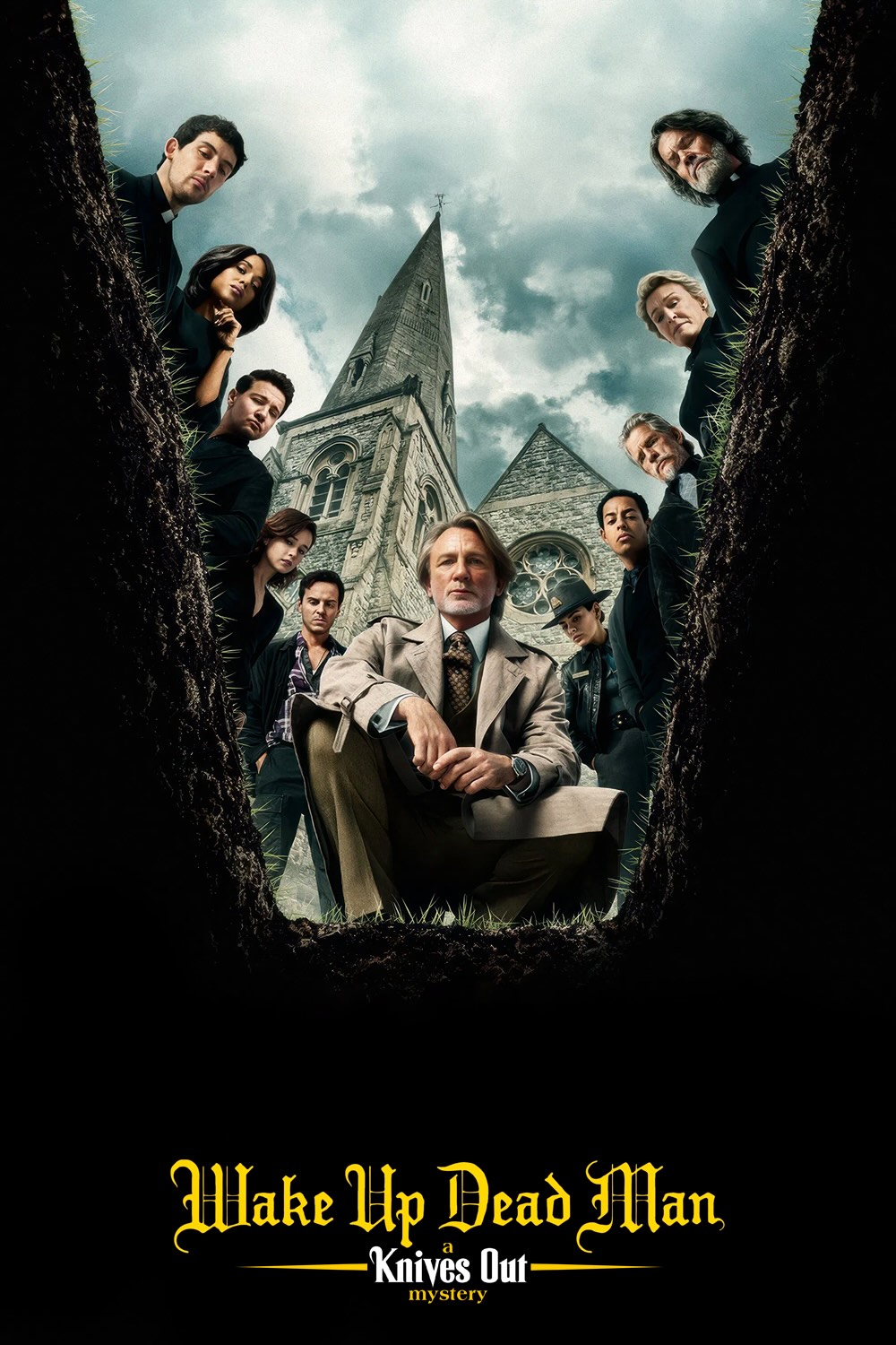 Poster for the film Wake Up Dead Man. The camera is looking up from the bottom of a grave. Around the edge of the grave, looking down are the eclectic cast of the film. In the background we can see the looming spire of a church.