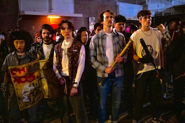 A group of punks with makeshift weapons get ready to beat the shit out of some Nazis